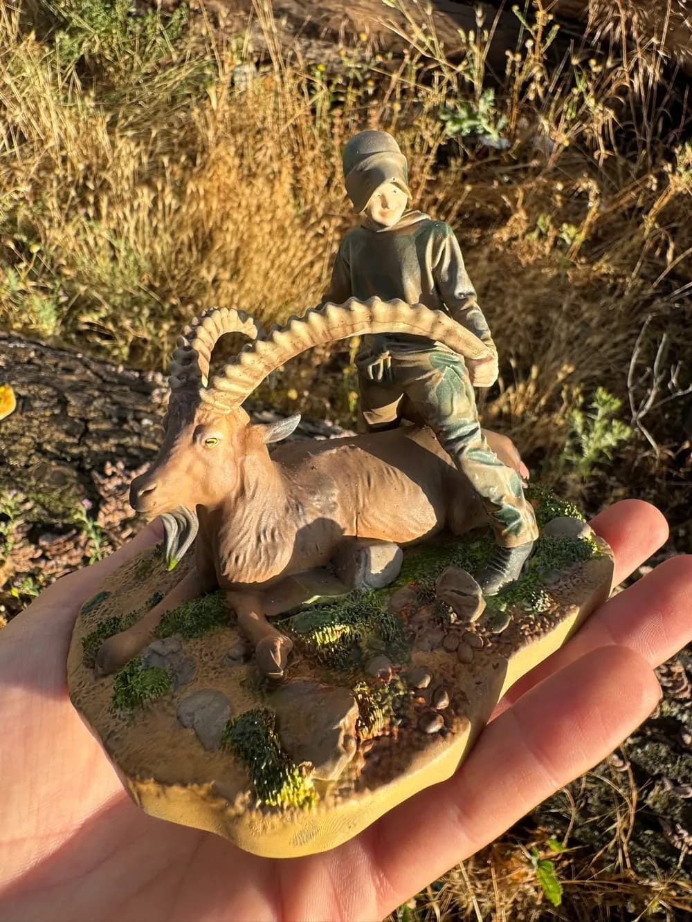Miniature ibex hunting scene